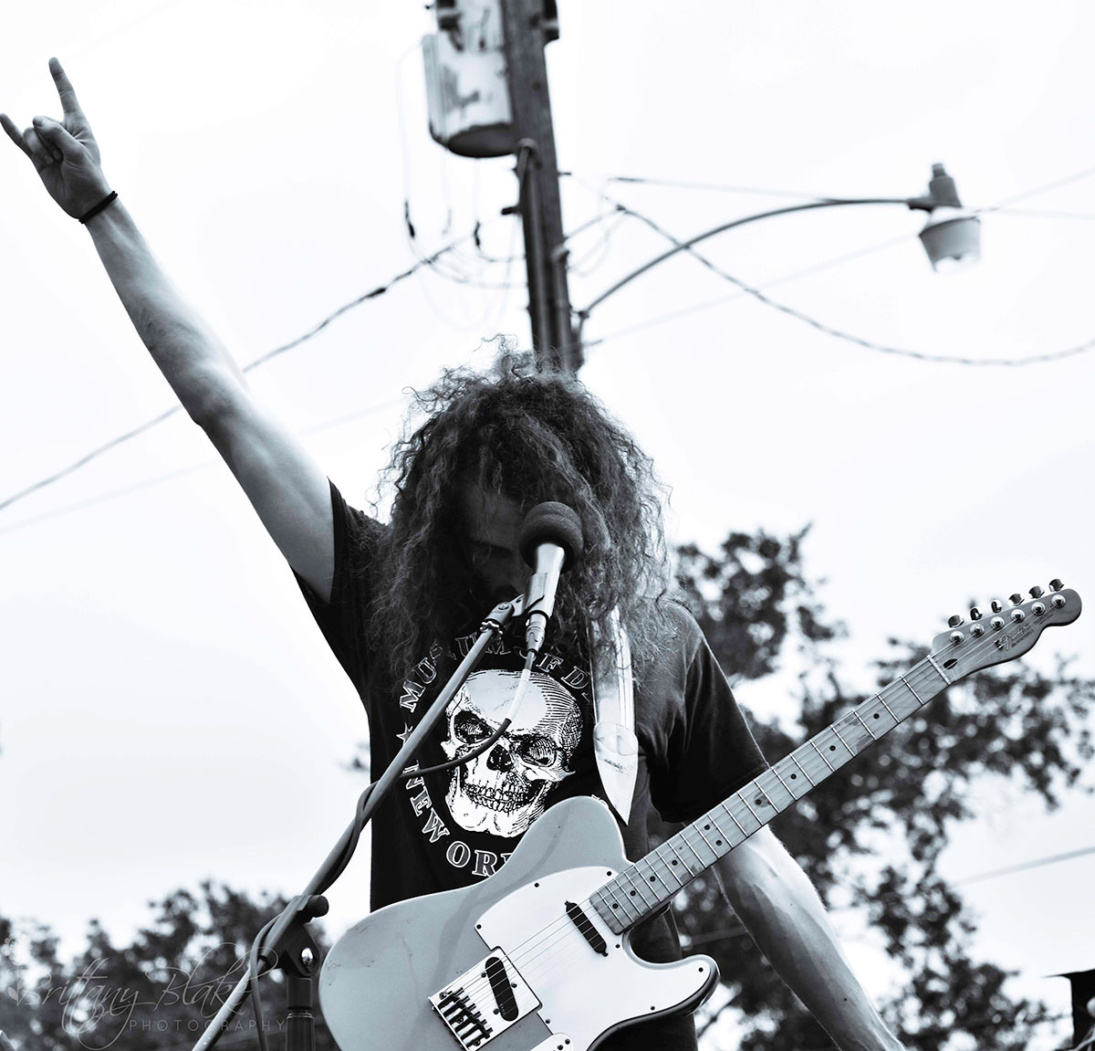 UL Lafayette Music business major Nick Tanner performs at a music festival