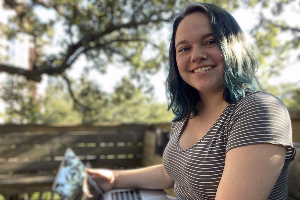 University of Louisiana at Lafayette middle school education major Morgan Roussel sits under an oak tree on campus