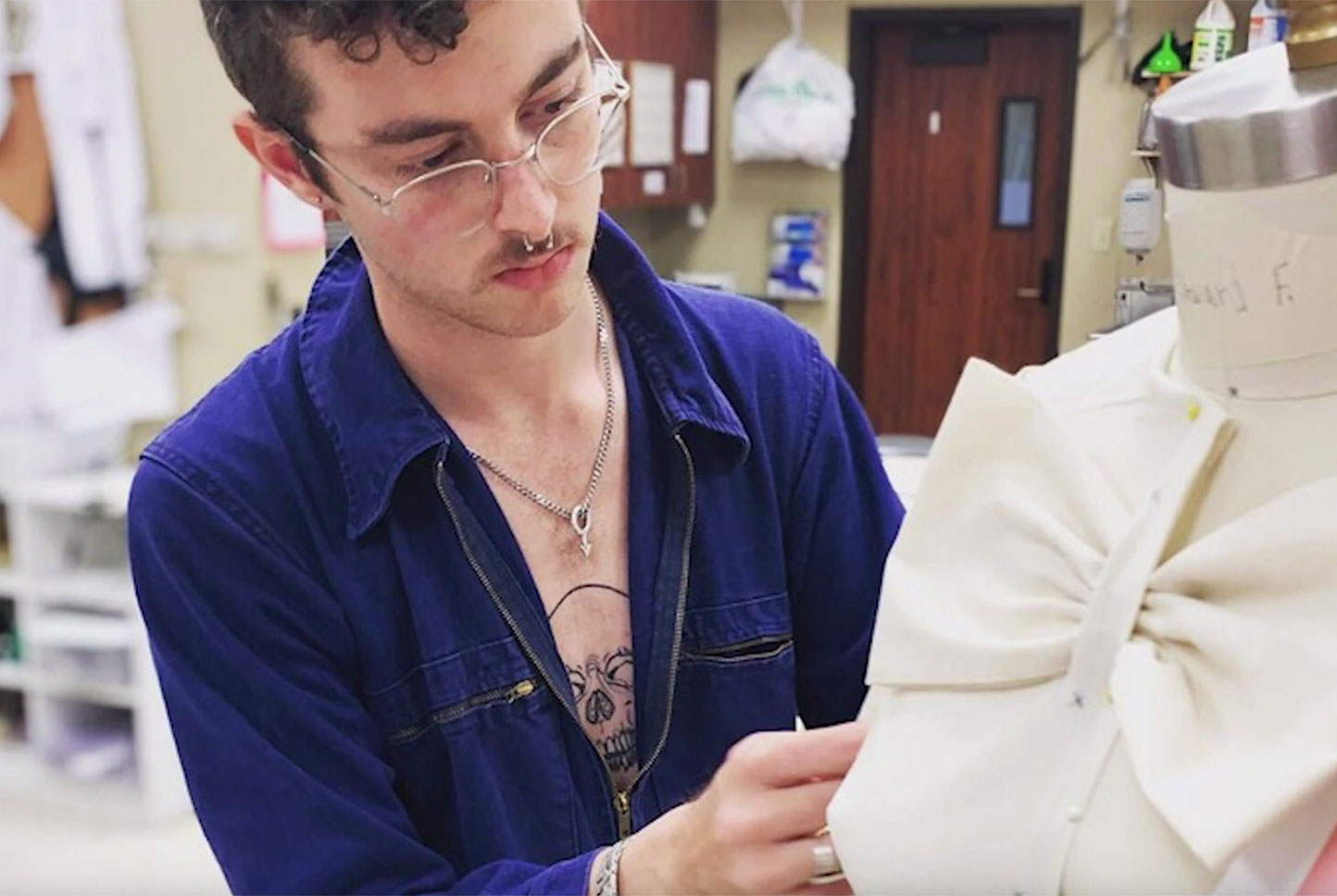 University of Louisiana at Lafayette theatre student Edouard Ferrell works on a costume in the theatre shop