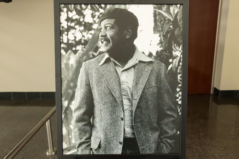 A framed black-and-white portrait of Ernest Gaines