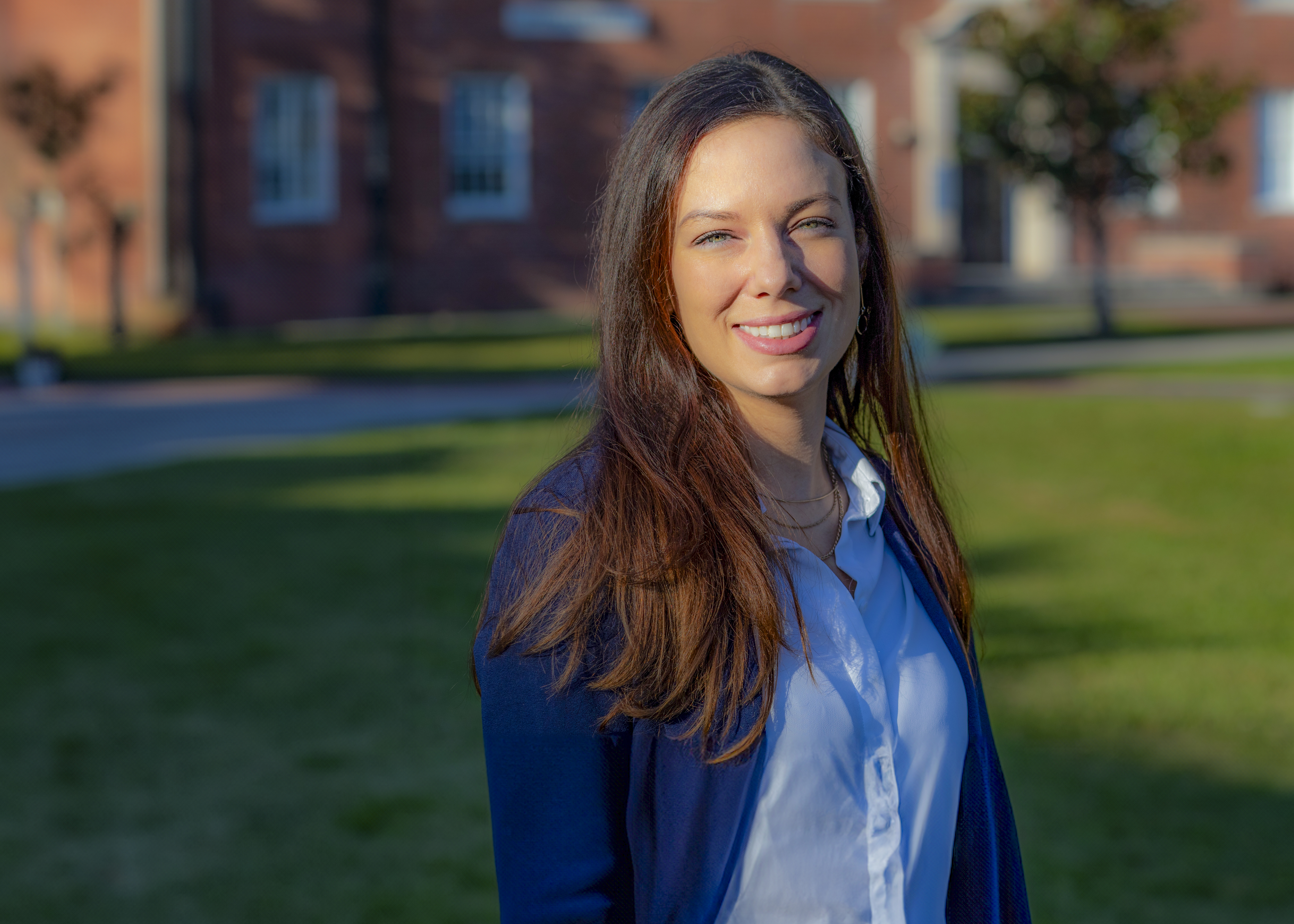 Casey Fontenot, MS in Accounting graduate, is pictured in the UL Lafayette quad.