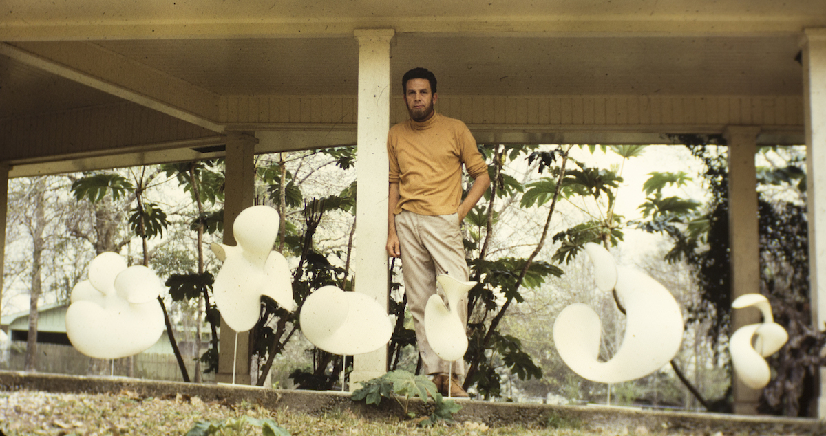 Robert Wiggs left a lasting impact on Lafayette through art and education. This archive portrait of him was taken in front of some of his outdoor sculptures. 