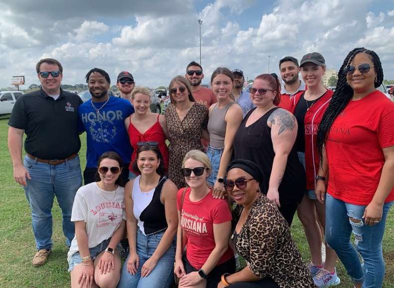 Rhonda Delasbour attends a crawfish boil hosted by the University's MBA Association.