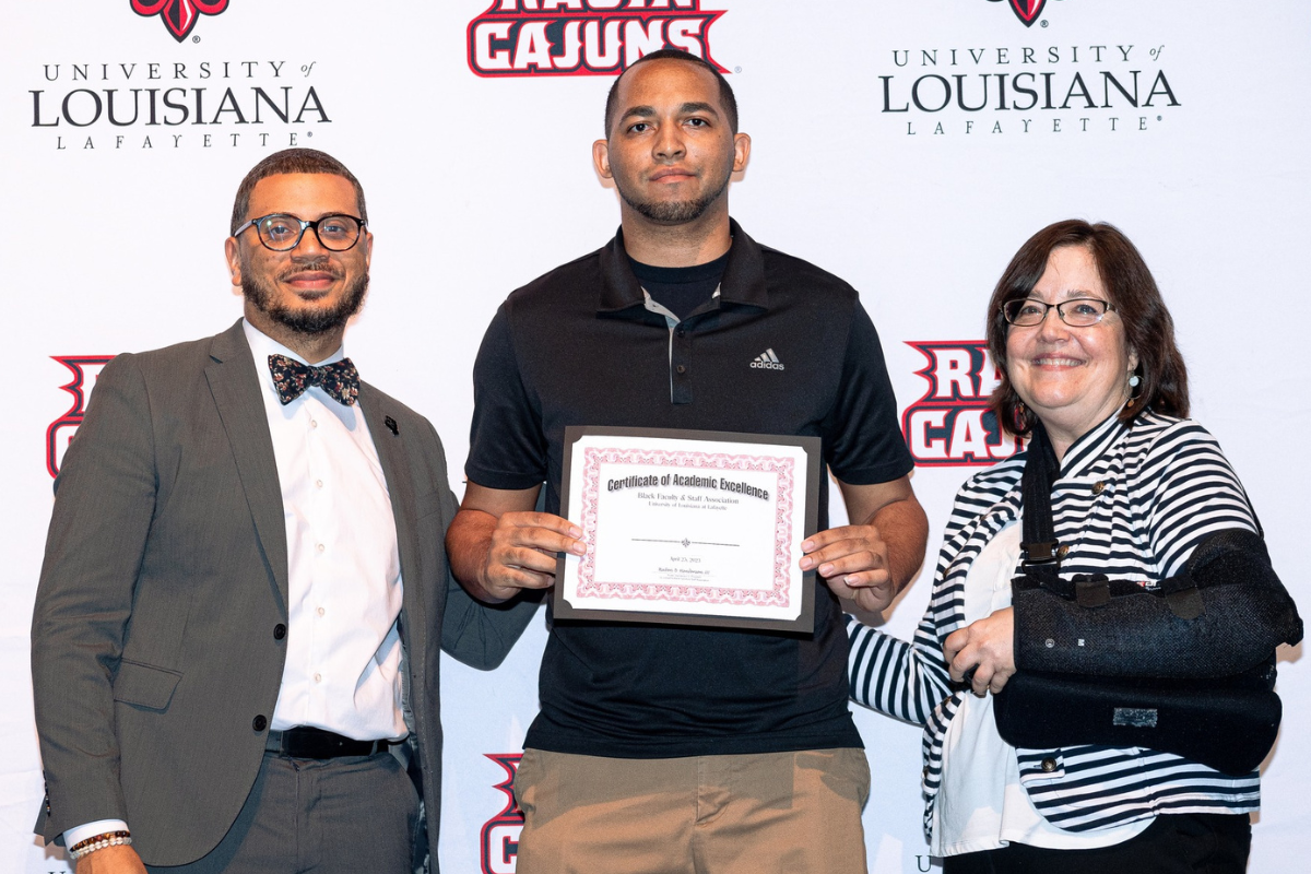 Clarence Chapman receives his 2023 Black Student Achievement Award.