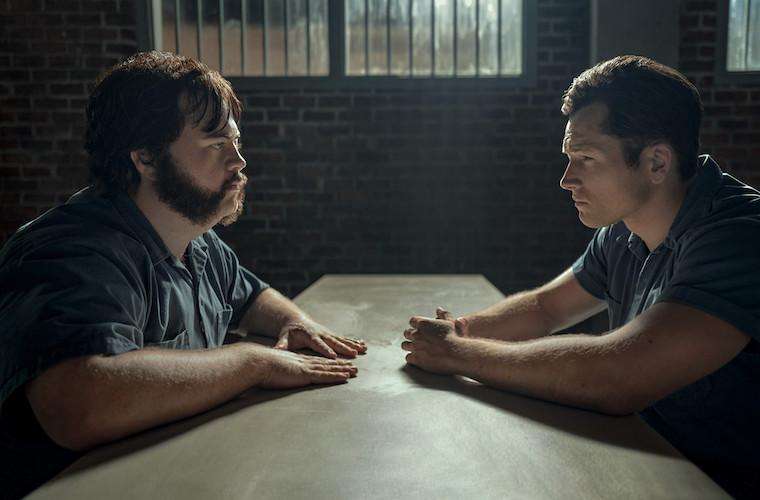 Paul Walter Hauser and Aaron Egerton in a scene from Apple TV+'s 'Black Bird' shot by Natalie Kingston.