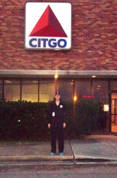 UL Lafayette chemical engineering major Rachel Long stands in front of a Citgo building.
