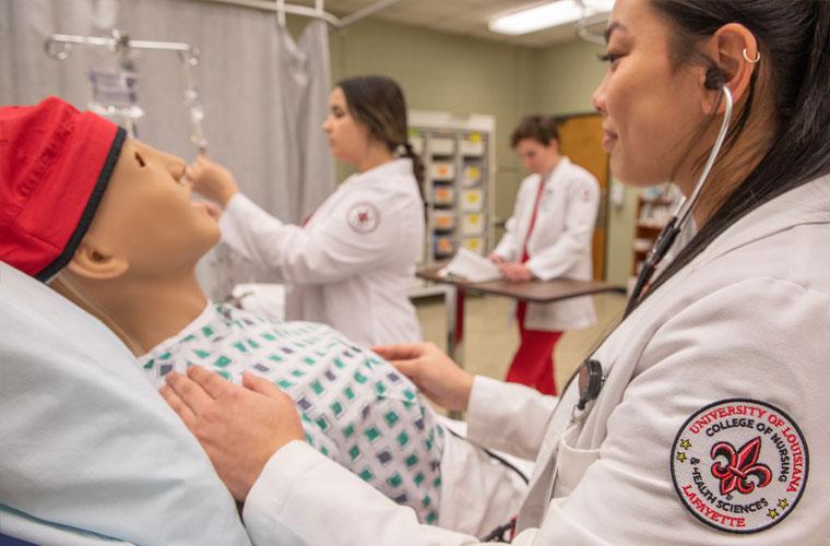 Nurses working in simulation lab