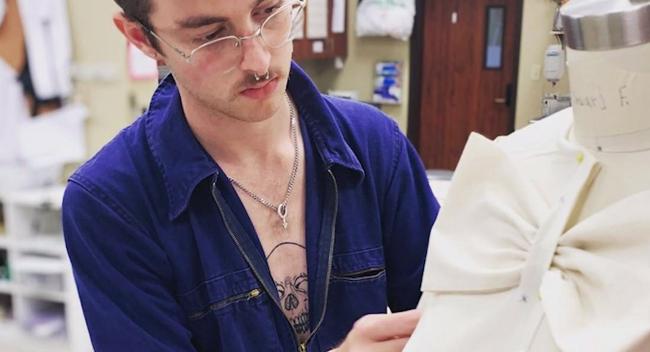 University of Louisiana at Lafayette theatre student Edouard Ferrell works on a costume in the theatre shop