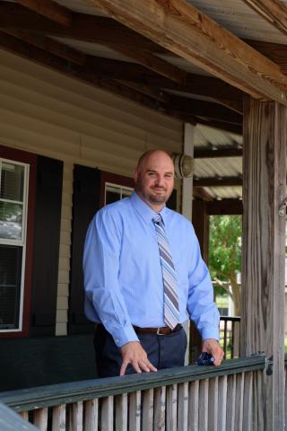 Dr. Donald Thornton stands in front of Westminster Christian Academy in Lafayette, where he will lead the new upper school. 