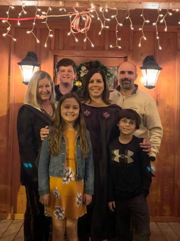 Michelle Hunt celebrates her graduation with her family.