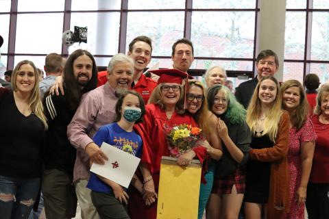 Melanie Fontenot with her cheering section during commencement, Spring 2022.